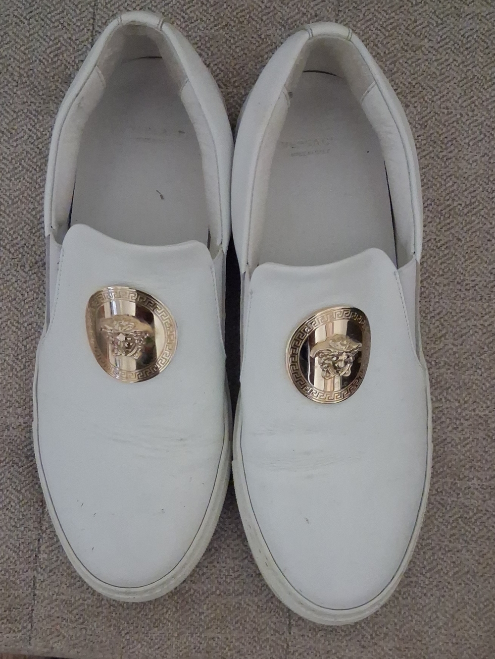 Versace White Slip-On Sneakers with Gold Medusa Plaques